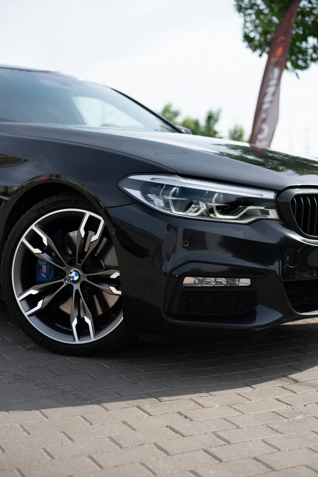 Black sports car exterior detail
