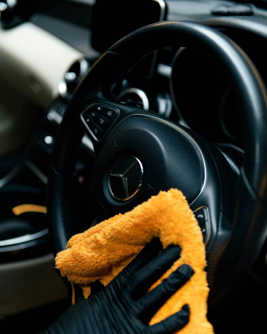 Detailing a wheel with a brush